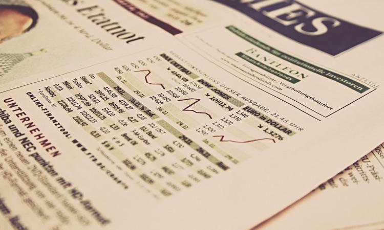 Newspaper depicting the stock markets section